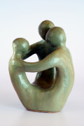 Ring of Friendship - ceramic - family group of three seated